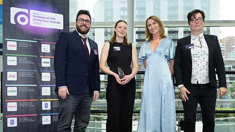 Tilly Sawyer on stage with her award alongside three other people at the targetjobs Undergraduate of the Year Awards.