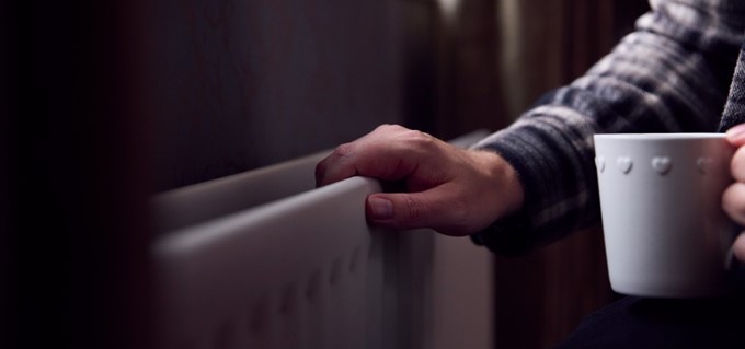 A hand holding a radiator