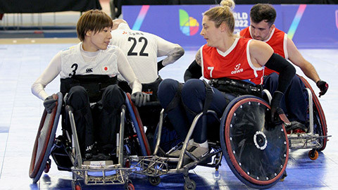 Female wheelchair rugby players competing. Image from World Wheelchair Rugby