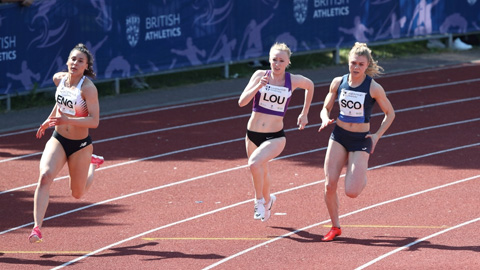 Beth Dobbin and two other runners on a track