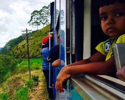 a child looking out of a train window