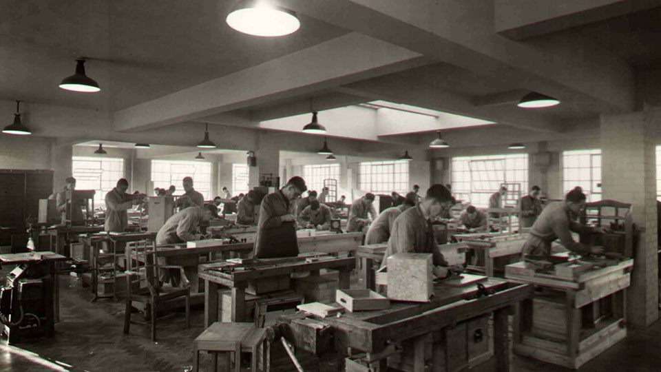 Historical image of items being produced at the handicraft unit