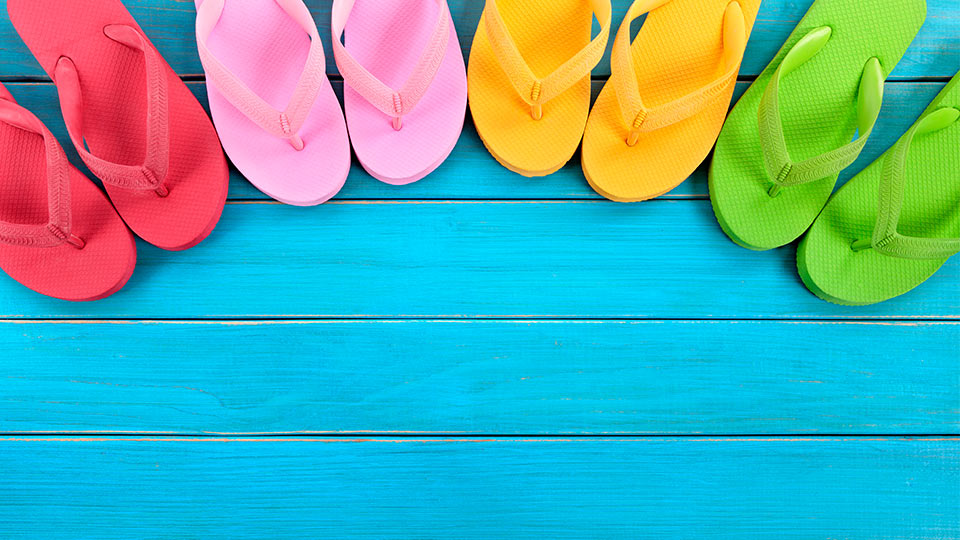 Pictured are different coloured flipflops. 