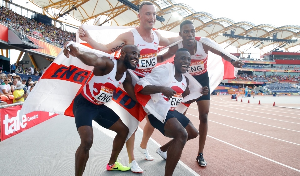 England celebrate winning gold in the 4x100m relay