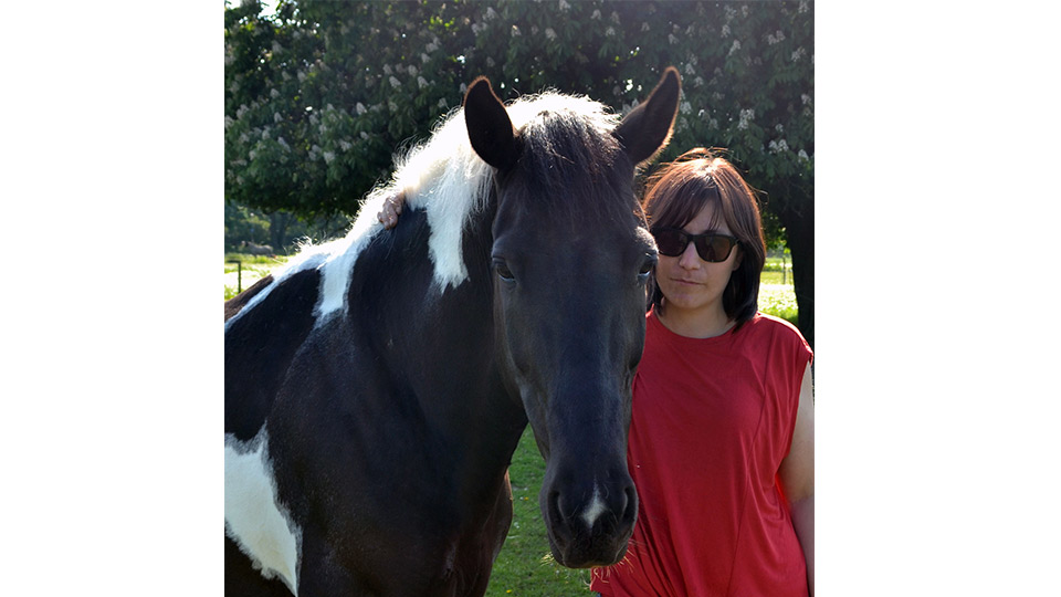 Pictured is Dr Carly Butler with Bilbo the horse.