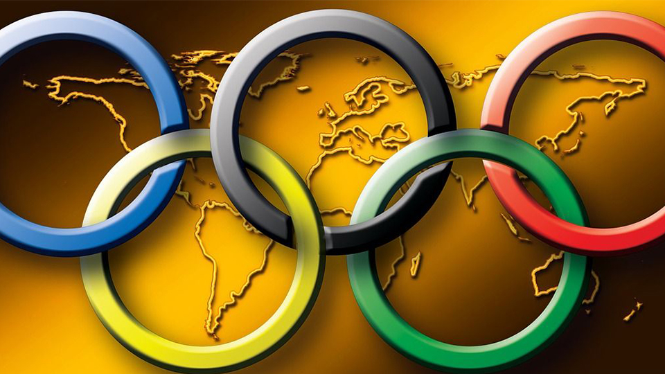 image of Olympic rings over the top of a World Map background