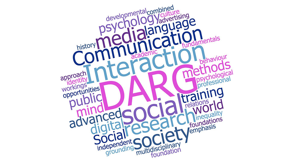 Pictured is the DARG logo, it is made up of a collection of words, in the colours pink, purple and blue, that relate to the group. 