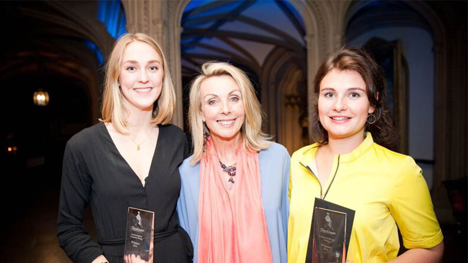 Fashion students receiving awards with Anne Davies