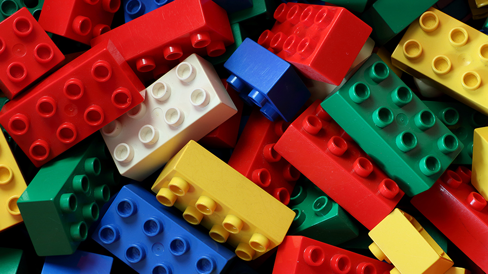 blocks of different coloured lego bricks piled on top of each other