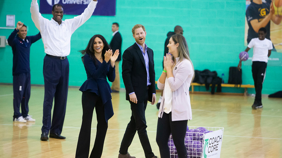 photo of Duke and Duchess of Sussex Prince Harry and Meghan playing netball with coaches and sportstars