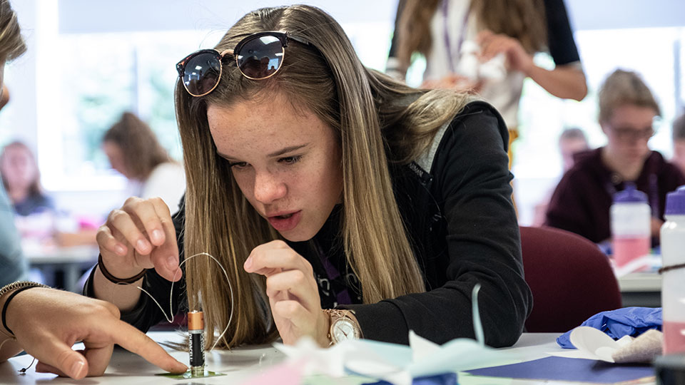 Pictured is a student working at the ‘Year 10 Girls into STEM’ residential.