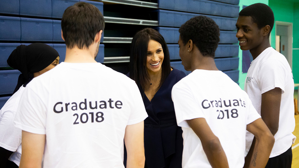photo of Duchess of Sussex Meghan talking to Coach Core coaches