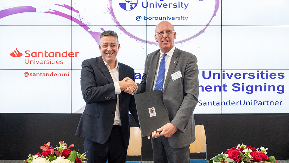 2019 photo of the Vice Chancellor and Director of Santander Universities UK shaking hands at an event at the University