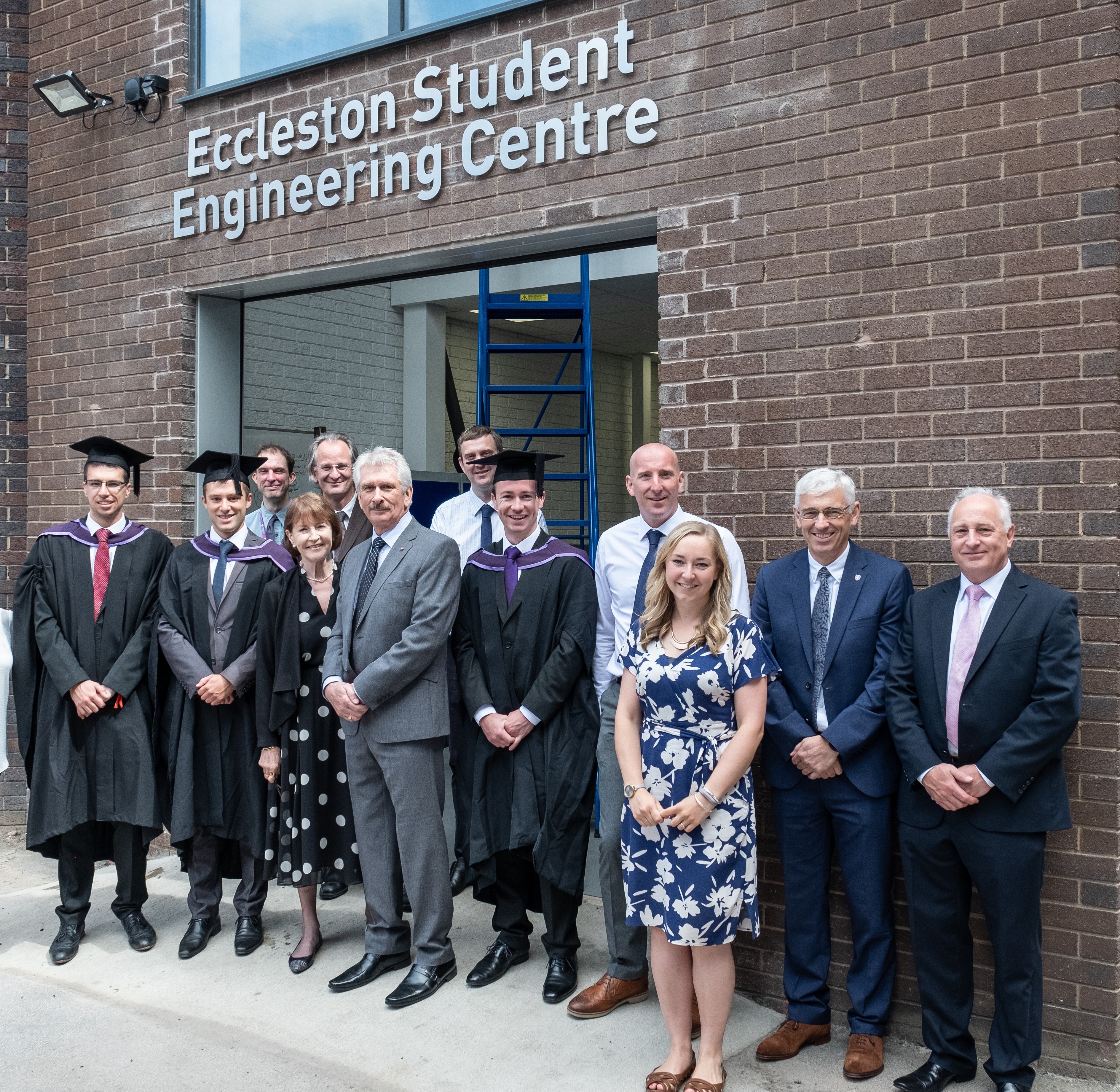 A photo of the opening of the Eccleston Student Centre, with members of the Formula Student team, Valerie and Barry Eccleston and Rachel Third in  a group photo