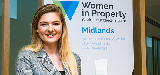 photo of student Alice Fox winning the Midlands Women in Property Student Awards