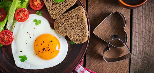 photo of a breakfast meal (egg and bread)