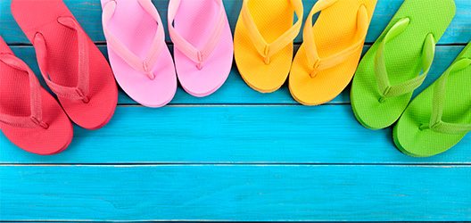 Pictured are different coloured flip flops. 