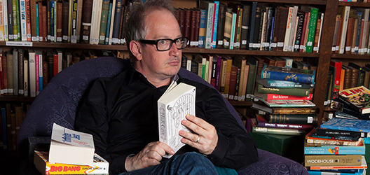 Photo of robin ince sat on a chair