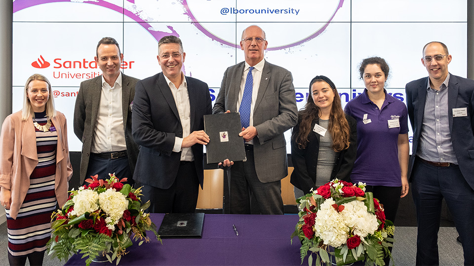 photo of Santander signing with staff and students from the University as well as Santander Universities UK representatives