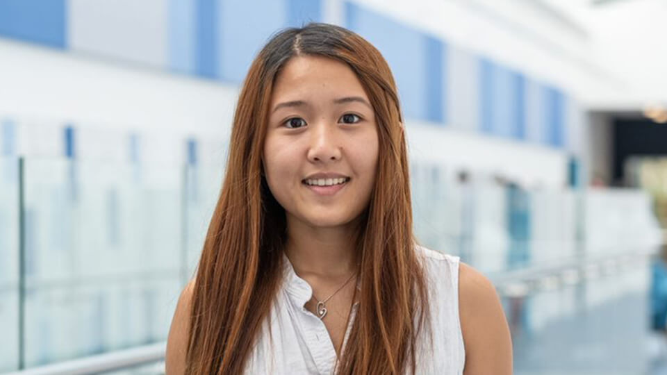 Student smiling in STEMLab