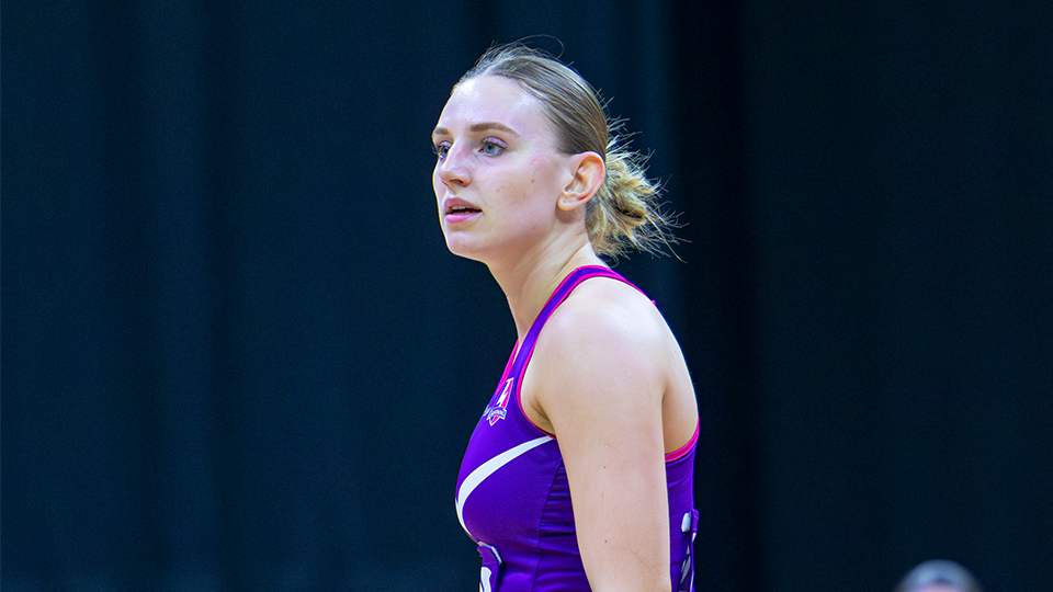 marlene lange looking across court mid-game