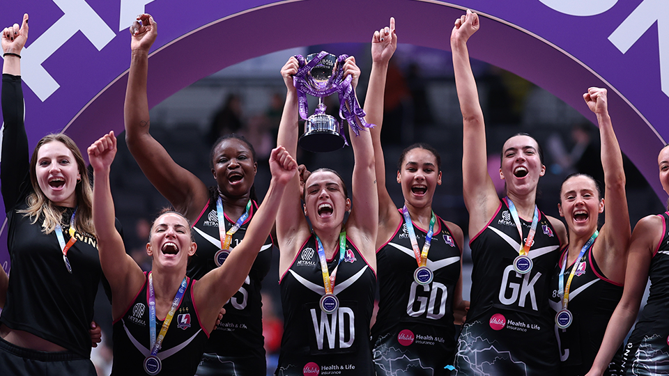 lightning team lifting the super cup trophy