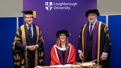 Sarah Hunter seated in the centre of the image with Lord Sebastian Coe to the left of the image and Professor Nick Jennings on the right