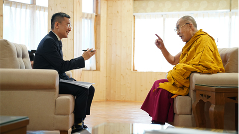 Paul interviewing the fourteenth Dalai Lama 