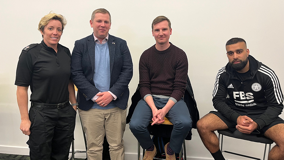 Four people are pictured together in front of a blank wall. Left to right: Aimee Ramm, Alex Laybourne, Jonathan Rudge, Mehul Karia 