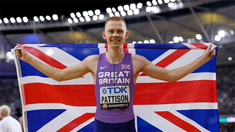 Recent Loughborough graduate Ben Pattison following his bronze medal win in the 800m meters. He holds  GB flag. Image provided by PA/ Alamy.
