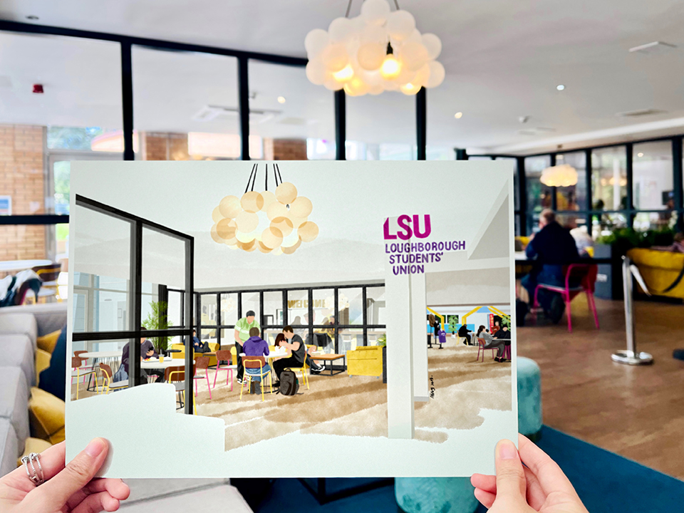 Two hands holding an illustration of the LSU lobby in front of the LSU lobby. the image depicts sofas chairs and people studying and sitting around the room
