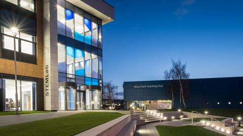 STEMLab and West Park Teaching Hub buildings at dusk