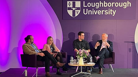The four AI panellists seated against a purple backdrop with the university logo on the wall. 
L-R: Dr Martin Sykora, Dr Georgina Cosma, Dr Saul Albert, and Professor Nick Jennings.