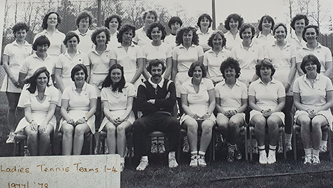 A black and white image of the first ladies tennis team. 27 seven women posing in three different rows in tennis kit with Rod Thorpe sitting in the middle of the front row. In the bottom left corner it reads ' Ladies Tennis Teams 1-4 1977/'78.