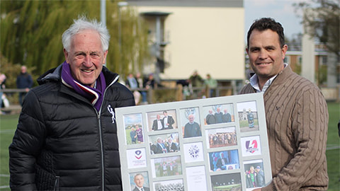 Rex Hazeldine is presented with a selection of photographs from his time supporting Loughborough Sport and Loughborough Students’ Rugby by Director of Rugby, Rhys Edwards.