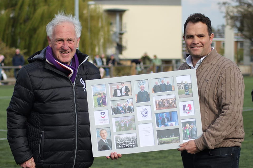 Rex Hazeldine is presented with a selection of photographs from his time supporting Loughborough Sport and Loughborough Students’ Rugby by Director of Rugby, Rhys Edwards.