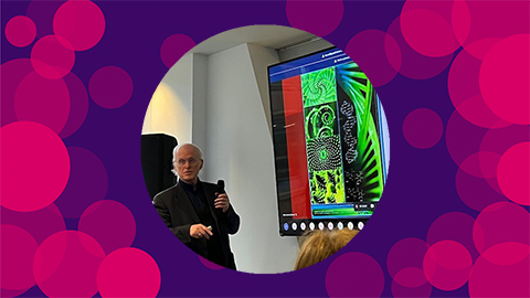 A purple background with pink circles on with an image of Derek presenting in the middle of the canvas.