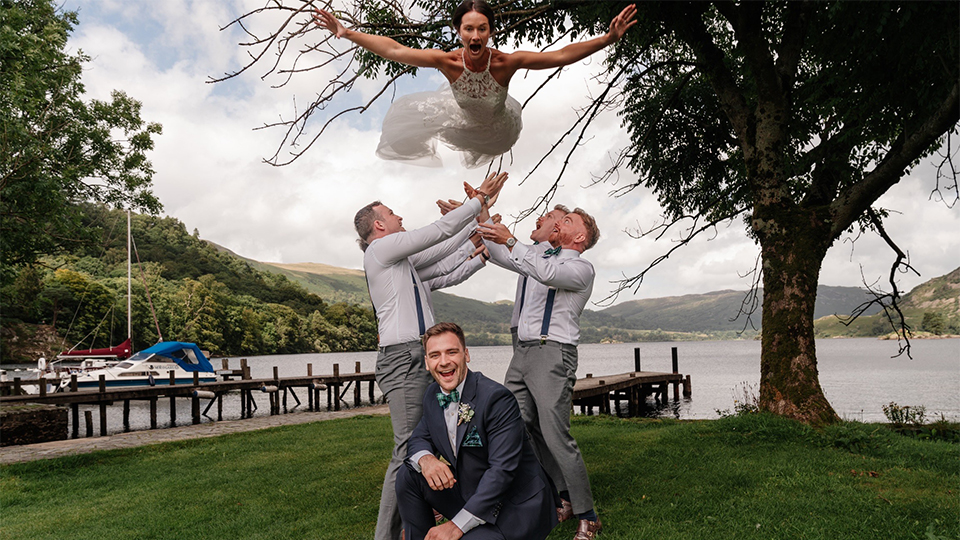 Ryan and Rosie doing gymnastics at their wedding