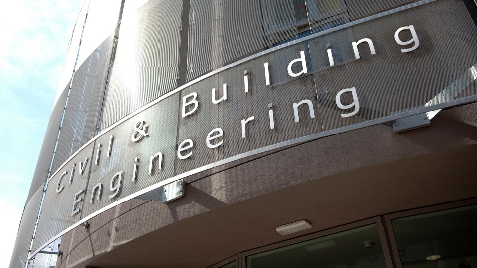 Side of a building with a sign on that reads Civil & Building Engineering