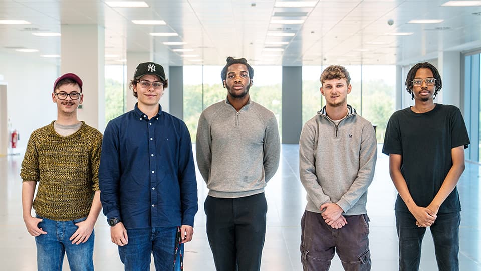 Five people standing