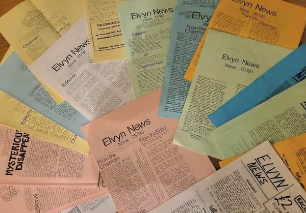 the Elvyn Newsletters on colourful pieces of paper