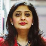 A head and shoulder shot of Rajinder Bhuni wearing a red jacket