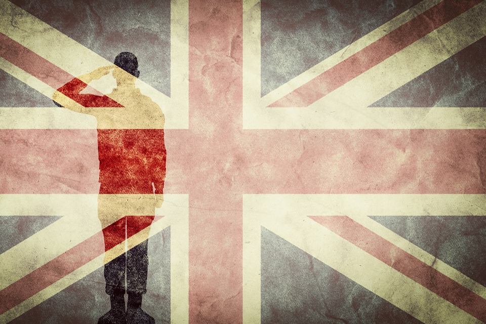 a union jack flag with a shadowy figure saluting