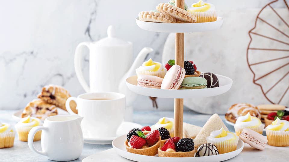 Summer dessert table, three tiered tray with desserts