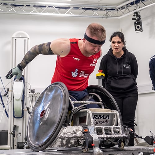 A wheelchair athlete in the sports performance centre