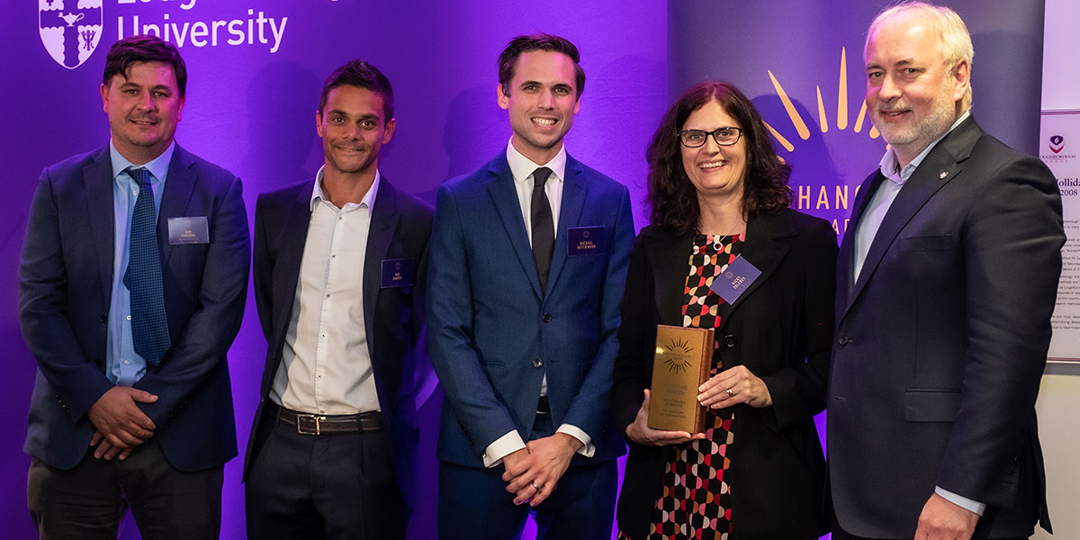 Members of the Peter Harrison Centre for Disability Sport receiving their award from Professor Dan Parsons and Vice-Chancellor, Professor Nick Jennings