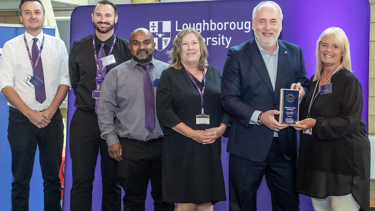 Five members of the front-of-house catering team receiving their VC Award from the Vice-Chancellor, Nick Jennings