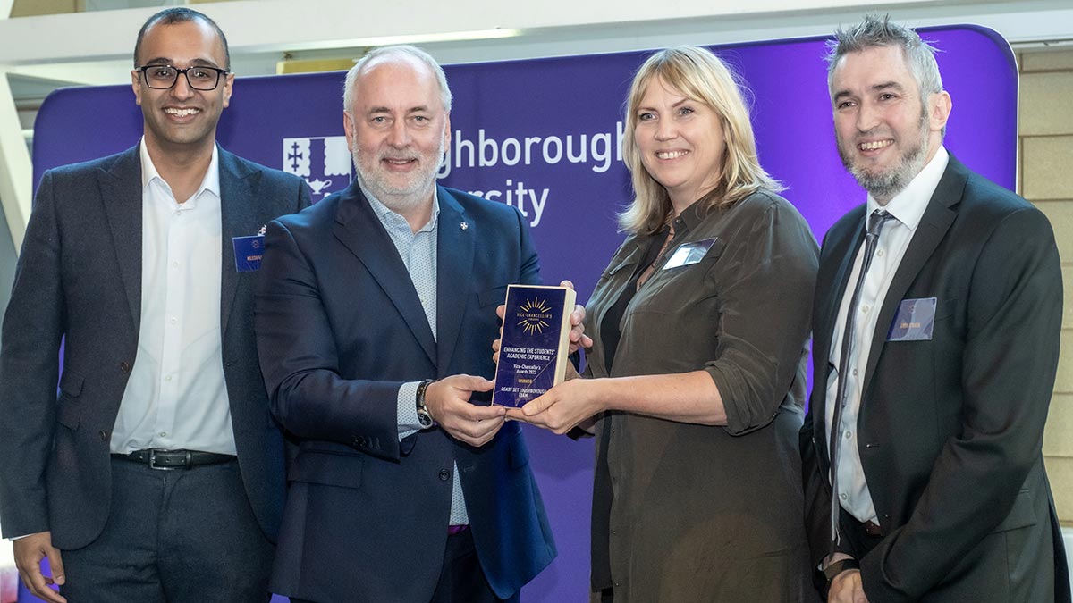 Three members of the Ready Set Loughborough team receiving their VC Award from the Vice-Chancellor, Nick Jennings