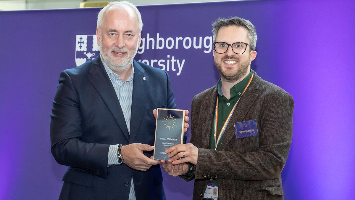 Tim Hewes-Belton receiving their VC Award from the Vice-Chancellor, Nick Jennings