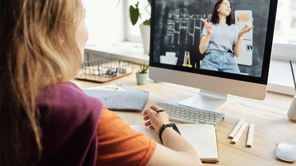 Student watching online lecture